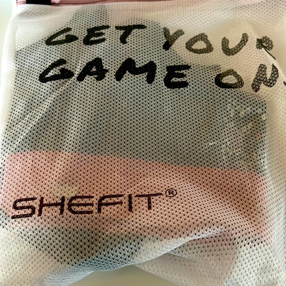 SheFit green/pink sports bra
